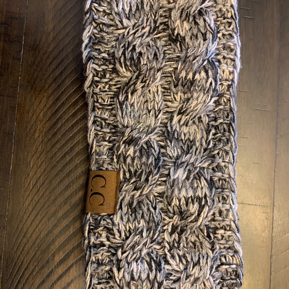 Black and white C. C ear warmer